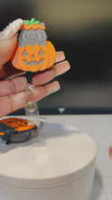 Load and play video in Gallery viewer, Halloween Cat Pumpkin badge reel
